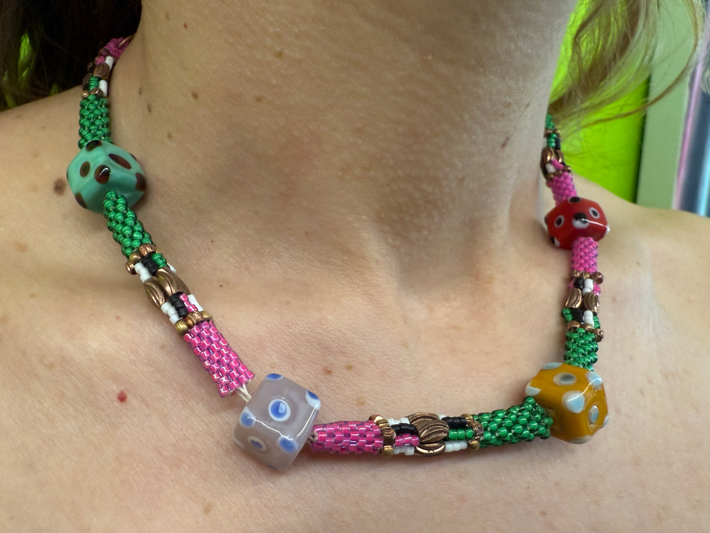 Daniela Mamon dice beaded necklace